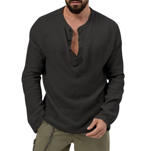 Detailed close-up of men's black long-sleeve Henley shirt showing the crinkle fabric texture