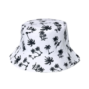 White bucket hat with black palm tree print for sun protection in summer vacation