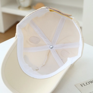 Detail view of toddler baseball cap interior with breathable mesh and reinforced stitching