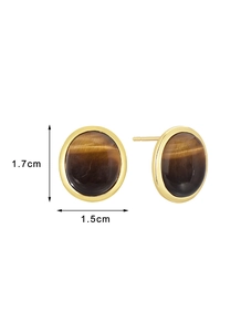 Detail view of round gold earrings with tiger eye stone and 1.7cm x 1.5cm dimensions