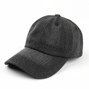 Close-up of a classic washed black dad hat with six-panel design and curved brim detail