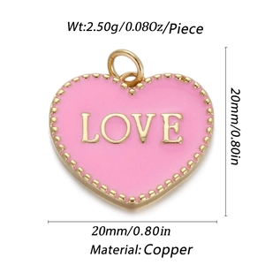 Detail of 14K gold plated pink heart LOVE pendant with beaded edges and copper base