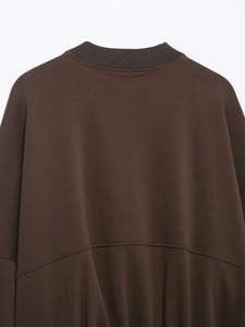 Detail of the dark brown sweatshirt back showing ribbed collar and premium stitching