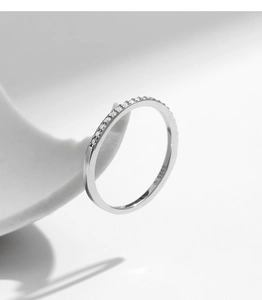 Detailed view of S925 hallmark on a polished sterling silver moissanite band ring