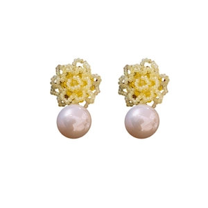 Fresh floral earrings with cream yellow petals and pearls for a vintage elegant look