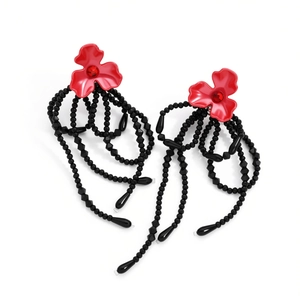Vintage floral tassel earrings with red flower stud and black beaded fringe design