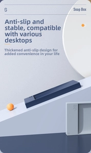 Detail view of non-slip rectangular soap holders in matte navy and grey finishes