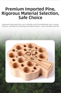 Macro detail of wood sensory toy with bird engravings made from natural pine wood
