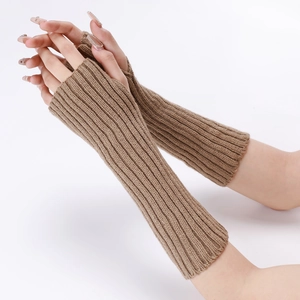 Close-up of khaki knitted fingerless arm warmers with vertical ribbed texture detail