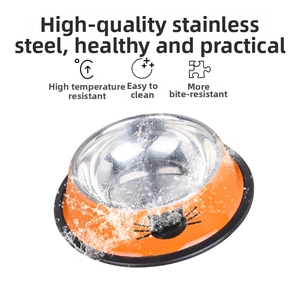 Detail of orange pet bowl with stainless steel liner showing high temperature resistance