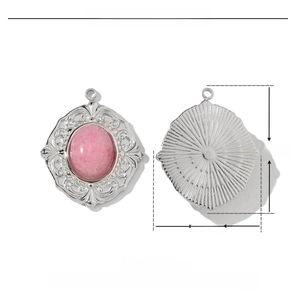 Macro view of pink natural stone pendant with retro embossed stainless steel base