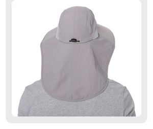 Detail view of the gray neck flap and breathable mesh panel on a sun protection fishing hat