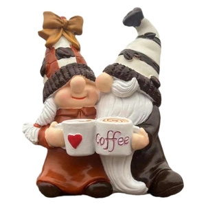 Gnome couple figurine holding coffee cups with heart design for home decor