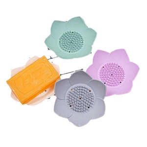 Lotus shaped silicone soap holders in four colors with drainage nodes for bathroom