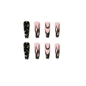 Long coffin press-on nails featuring black and pink star, moon, and flame patterns