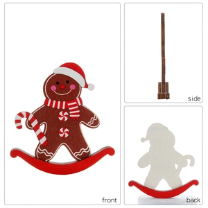 Wooden gingerbread man tumbler ornament on red rocking base for Christmas table decor