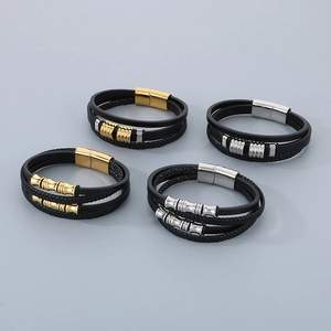 Detailed close-up of woven multilayer leather bracelets with magnetic steel clasps