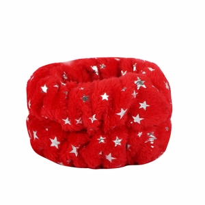 Detail of red plush Christmas headband with shiny silver star patterns and soft texture