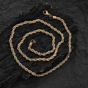 Detailed view of golden stainless steel rope chain with a durable lobster clasp closure