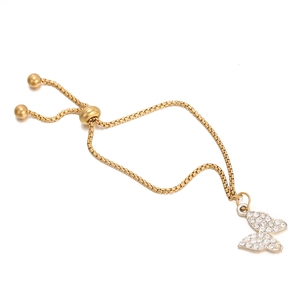 Detailed view of adjustable gold butterfly bracelet with white crystals and sliding clasp