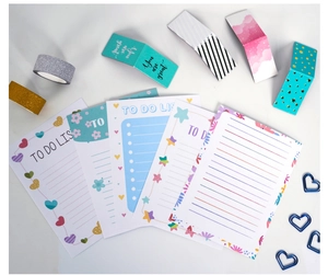 Detail of blue themed stationery set including to-do list pads and inspirational cards
