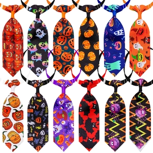 Detail of 12 Halloween pet neckties featuring pumpkins, ghosts, and spider patterns