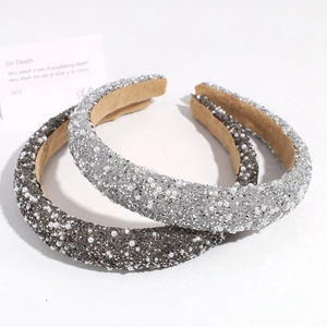 Sparkling rhinestone and pearl padded headbands in silver and grey with velvet lining