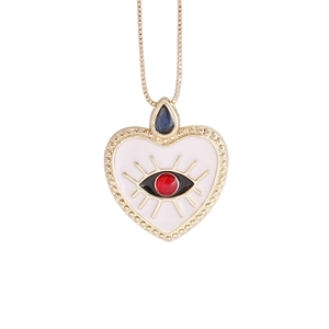 18K gold plated heart necklace with white enamel eye motif and blue crystal stone