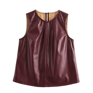 Burgundy faux leather sleeveless top with crew neck and gathered detail on white background