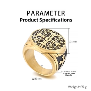 Detail of gold stainless steel Saint Benedict medal ring with vintage cross engraving