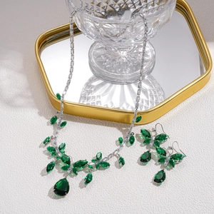 Vintage green crystal necklace and earrings jewelry set in ornate silver setting