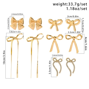Gold bow earring set with five styles including long tassels and crystal details