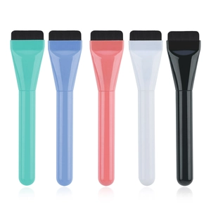 Detailed view of five colorful ultra-thin flat foundation brushes for seamless makeup