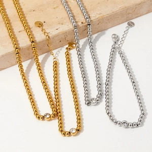 Geometric beaded stainless steel bracelets with clear gemstones in gold and silver finish