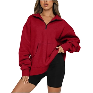 Women's red half-zip long sleeve sweatshirt with pockets and ribbed cuffs