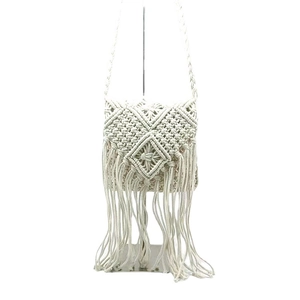 Handwoven cream cotton shoulder bag with bohemian stripes and long tassels
