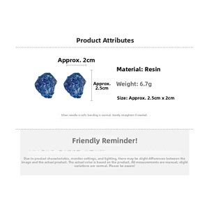 Detail view of irregular navy blue resin earrings with silver pins and size dimensions
