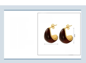 Macro view of 15x22mm 18K gold plated stainless steel earring with amber resin inlay