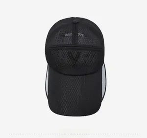 Detail of black mesh baseball cap with breathable fabric and Vogue embroidery
