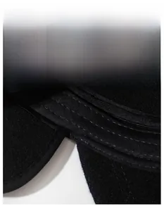 Detail of widened sweatband on winter hat lining showing breathable mesh and stitching