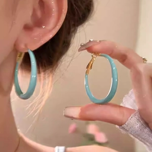 Minimalist lake blue enamel circle hoop earrings with golden clasp for women