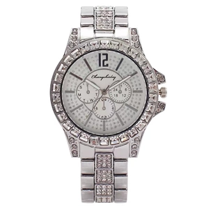 Detailed macro view of crystal-encrusted silver watch bezel and dial by CherryShirley