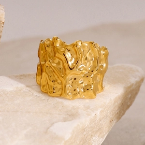 Irregular lava texture 18k gold plated stainless steel open ring on stone base