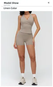 Women's flax yoga set with halter v-neck top and high waist shorts on a model