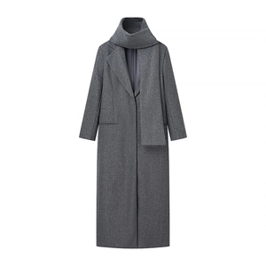 Women's mid-grey long wool coat with matching scarf and classic lapel collar
