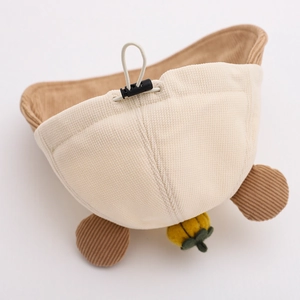 Close-up of beige corduroy children hat with elastic drawstring and khaki plush lining