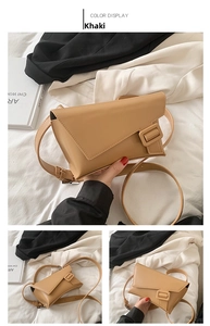 Close-up of khaki matte PU leather waist bag with asymmetric flap and buckle detail