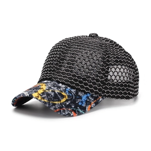 Detail of breathable mesh baseball cap featuring vibrant abstract graffiti print on the brim