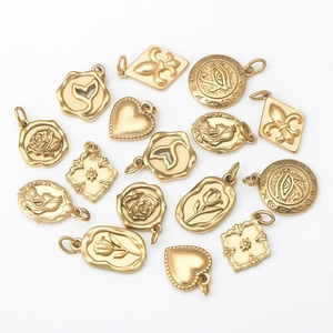 Golden stainless steel charms set with heart flower and whale tail shapes for DIY jewelry