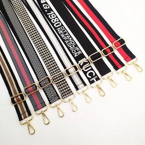 Adjustable crossbody bag strap replacement with striped patterns and gold metal hooks